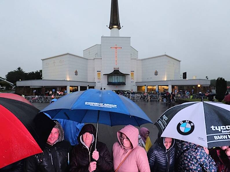 Papal visit sights and sounds: Early crowds brave the rain in Knock