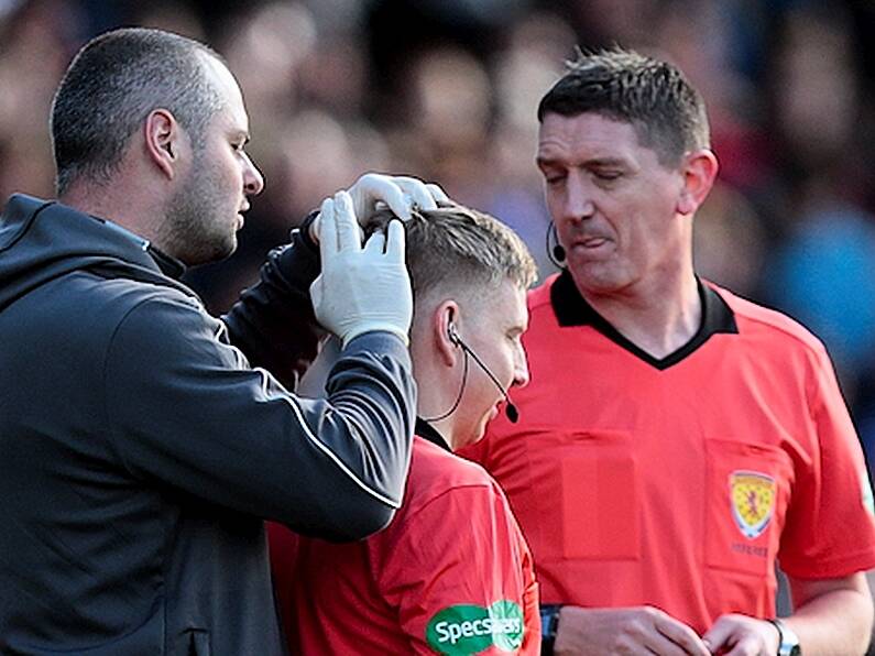 Police investigating as linesman bloodied by object thrown from Rangers fans' stand