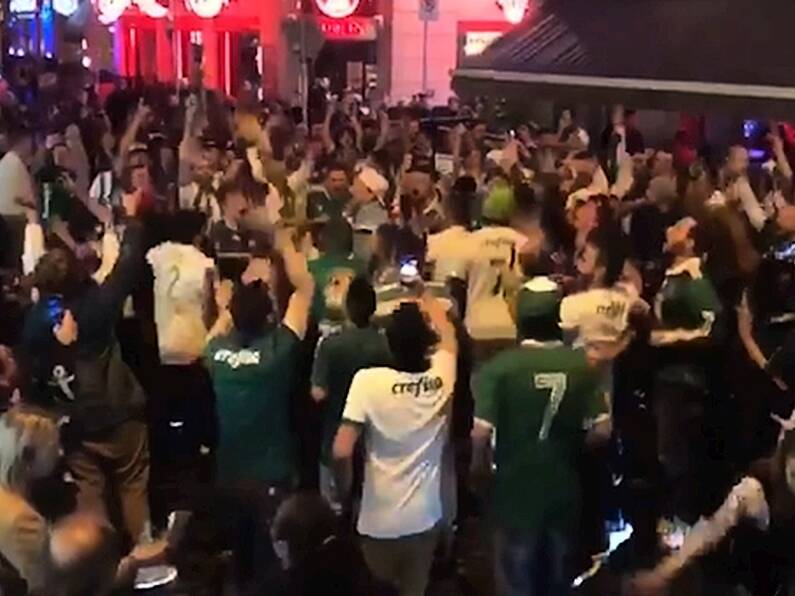 VIDEO: Brazilian soccer fans take over Temple Bar to celebrate home team's victory