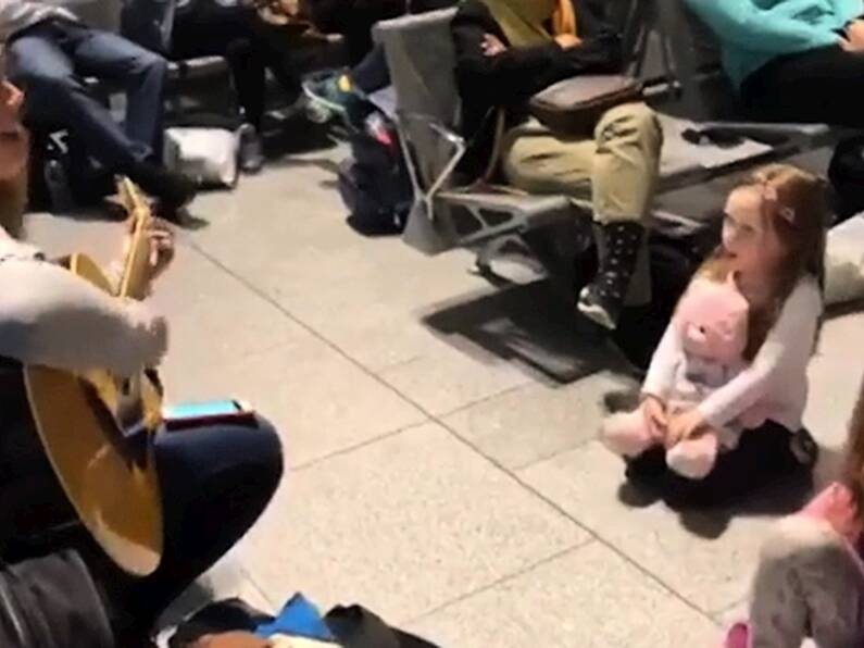 VIDEO: Impromptu sing-song breaks out in Dublin airport during six-hour flight delay