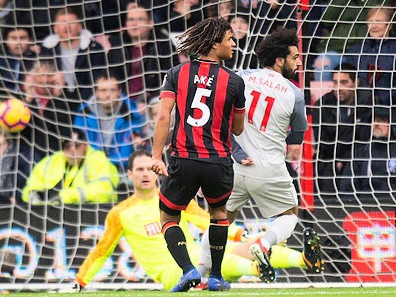 Salah hat-trick sends Reds top, for now