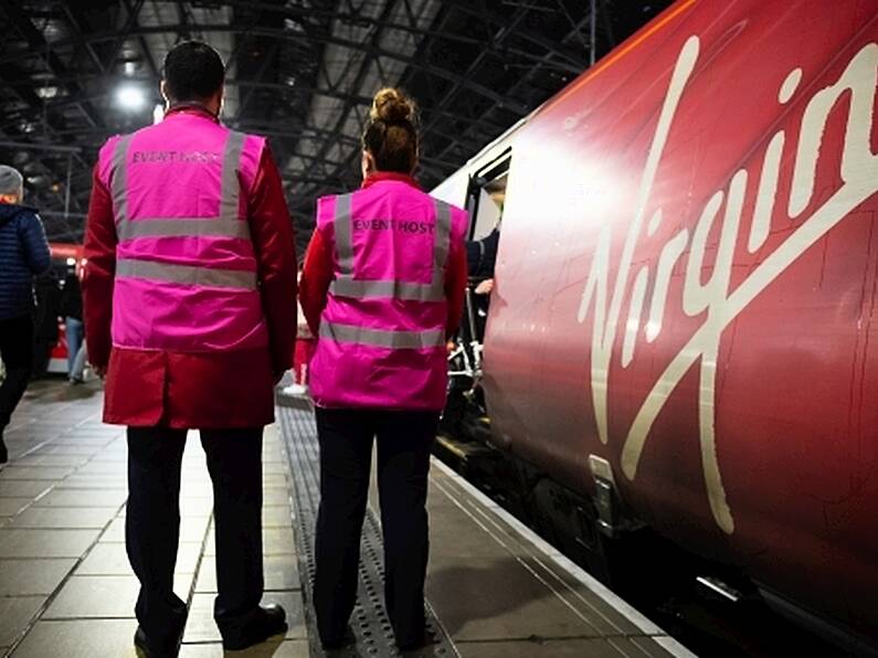 Rail staff with pink vests deployed to manage football fans in UK