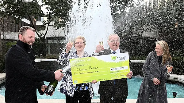 Retired farmer who survived cancer collects €500k EuroMillions cheque