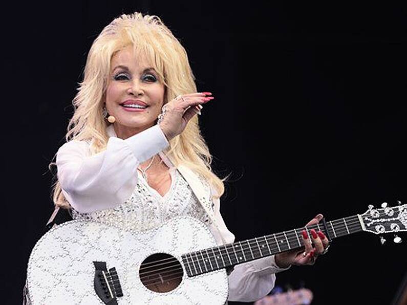 Country icon Dolly Parton accepts induction into the Rock & Roll Hall of Fame