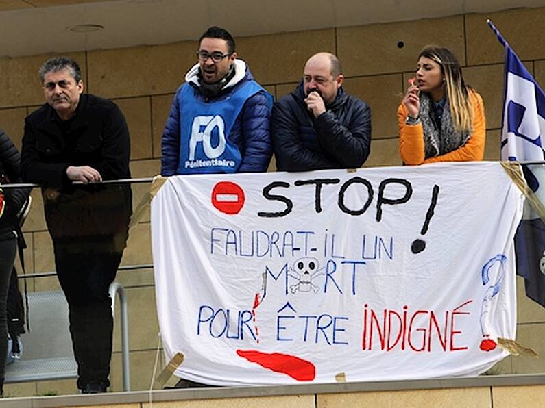 Guards block 18 French prisons after 'terrorist attack'