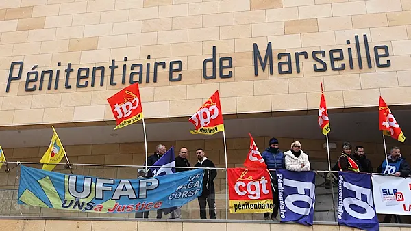 Guards block 18 French prisons after 'terrorist attack'