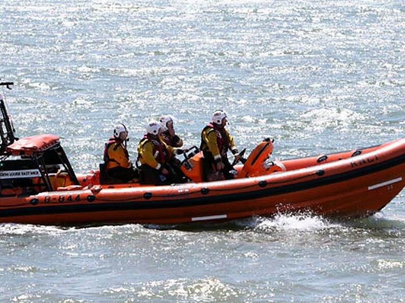 Pair rescued from roof of camper van after being cut off by tide