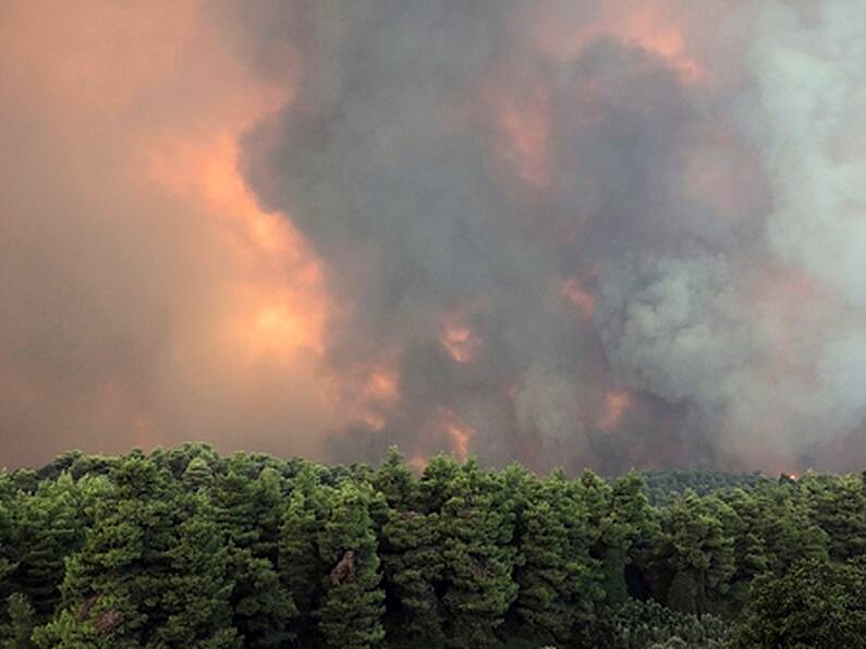 Athens blanketed in smoke as firefighters evacuate villages endangered by three wildfires