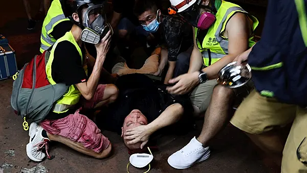 Tear gas fired in new Hong Kong protest as police vow 'to bring all culprits to justice'