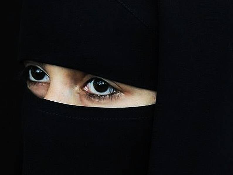 Netherlands law banning burka-style clothing comes into force today