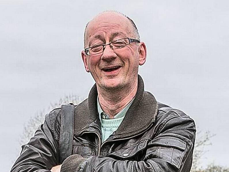 One of Ireland's most popular press photographers will be laid to rest today