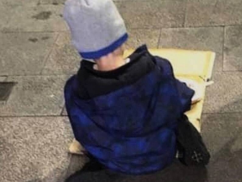 Photo of homeless boy, 5, eating dinner off cardboard on street sparks outrage