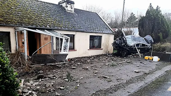 Car ploughs into porch of house; man arrested