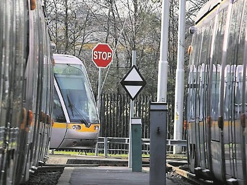 Woman's hair set on fire by teens on Luas