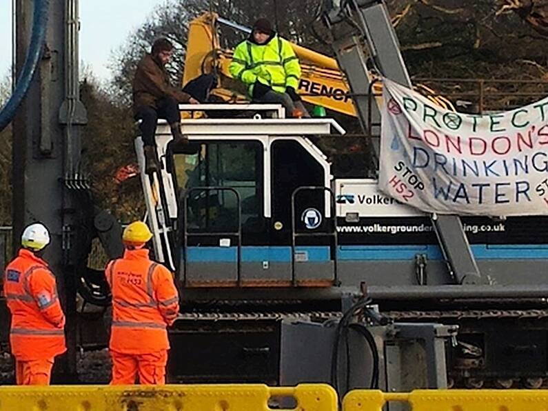 Former Paralympian climbs on to 100ft drill for Extinction Rebellion protest against UK's HS2