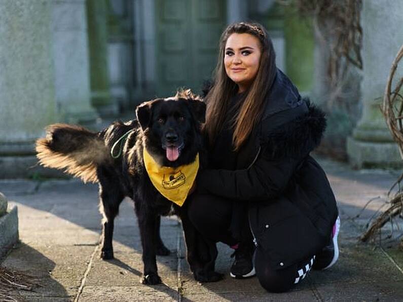 Woman with rare brain injury inspired by adopted dog's caring nature