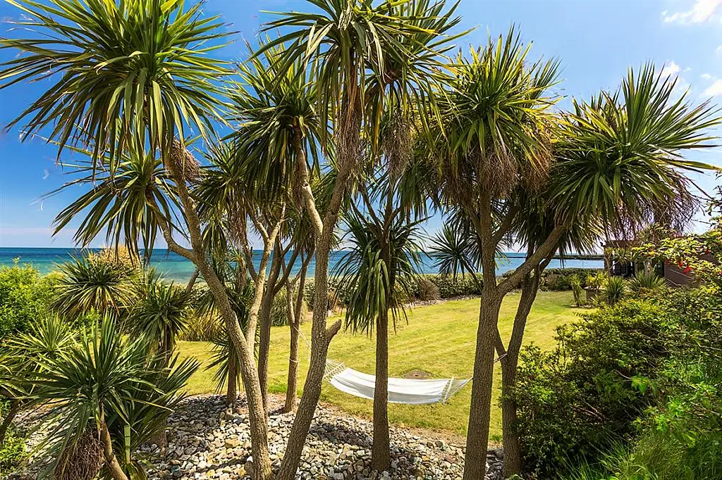 Pool at eye level with the ocean is this Irish coastal home's claim to fame