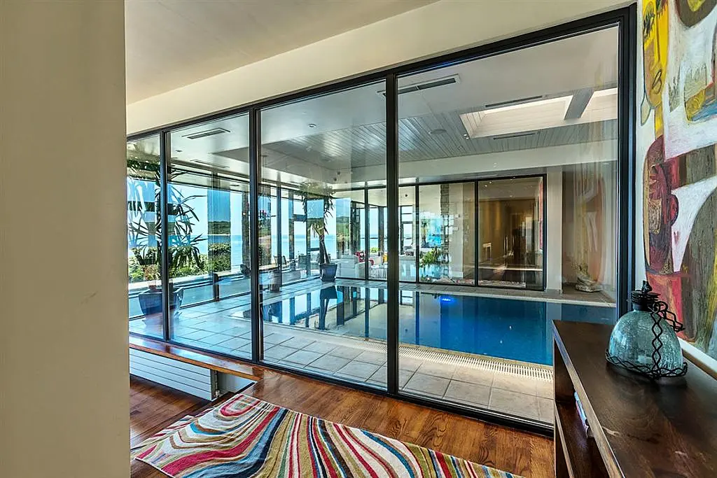 Pool at eye level with the ocean is this Irish coastal home's claim to fame