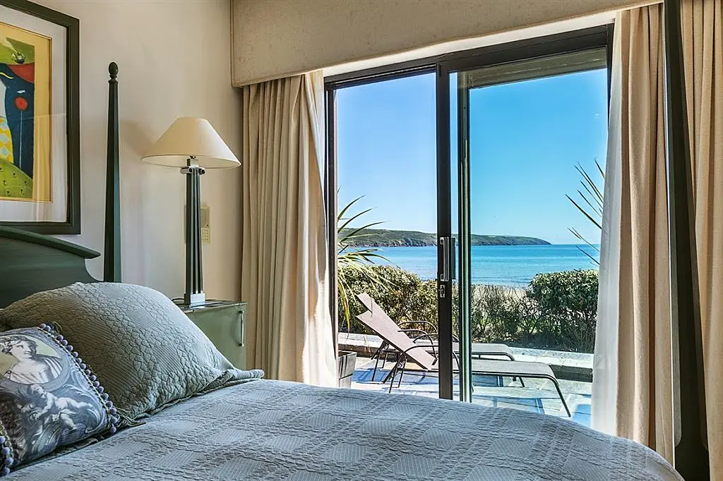 Pool at eye level with the ocean is this Irish coastal home's claim to fame