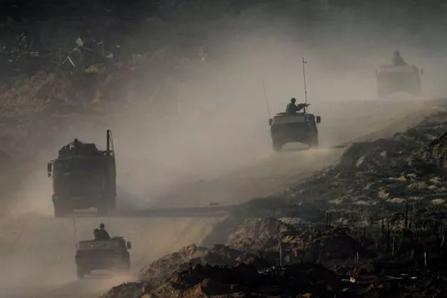 A convoy of Israeli troops moves in the Gaza Strip 