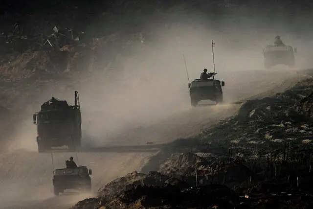 A convoy of Israeli troops moves in the Gaza Strip 