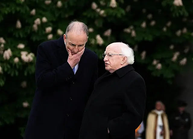 Taoiseach Micheal Martin (left) in conversation with President Michael D Higgins 