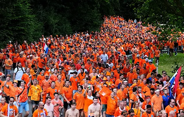 Lots of Netherlands fans walk in Dortmund