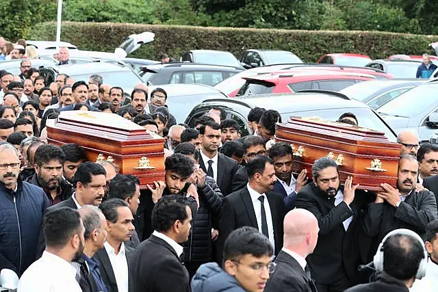 The coffins of Reuven Simon and Joseph Sebastian outside St Mary’s Church in Ardmore