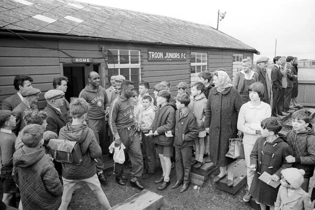Football fans in Troon, South Ayrshire gather to catch a glimpse of Pele ahead of the 1966 World Cup. Reigning world champions Brazil stayed in Scotland for a training camp in preparation for the tournament