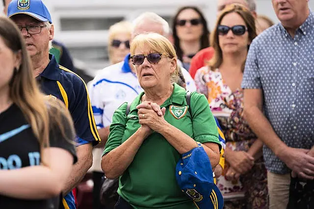 Members of the Irish community gather