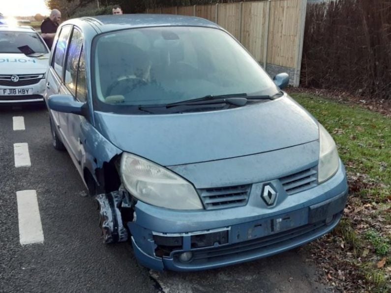 Man stopped by police after being caught driving car with missing wheel