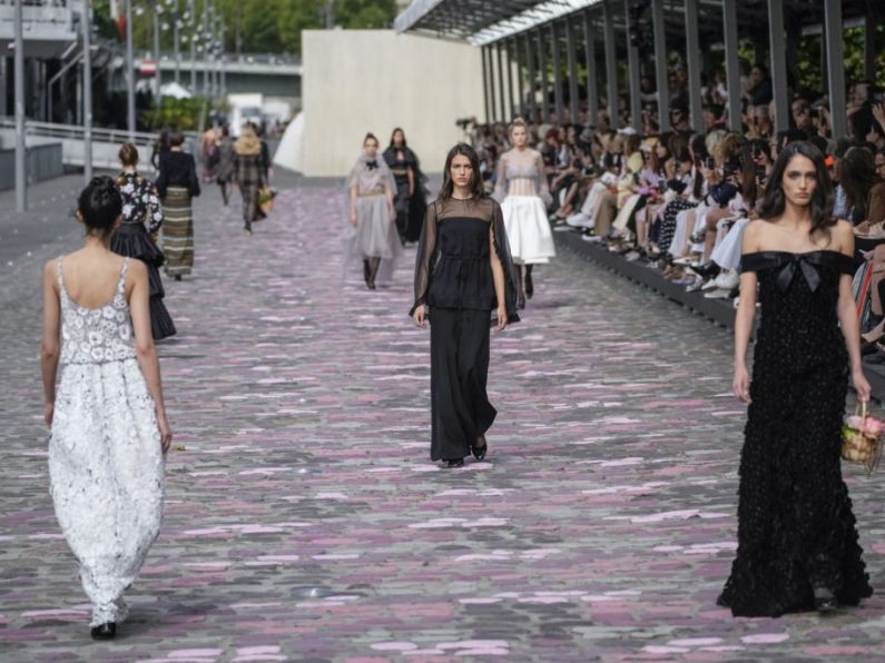Paris Fashion Week continues to draw stars in riot-hit France