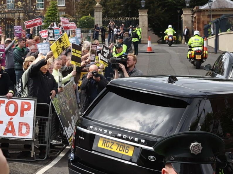 Boris Johnson jeered by protesters as he arrives in Northern Ireland