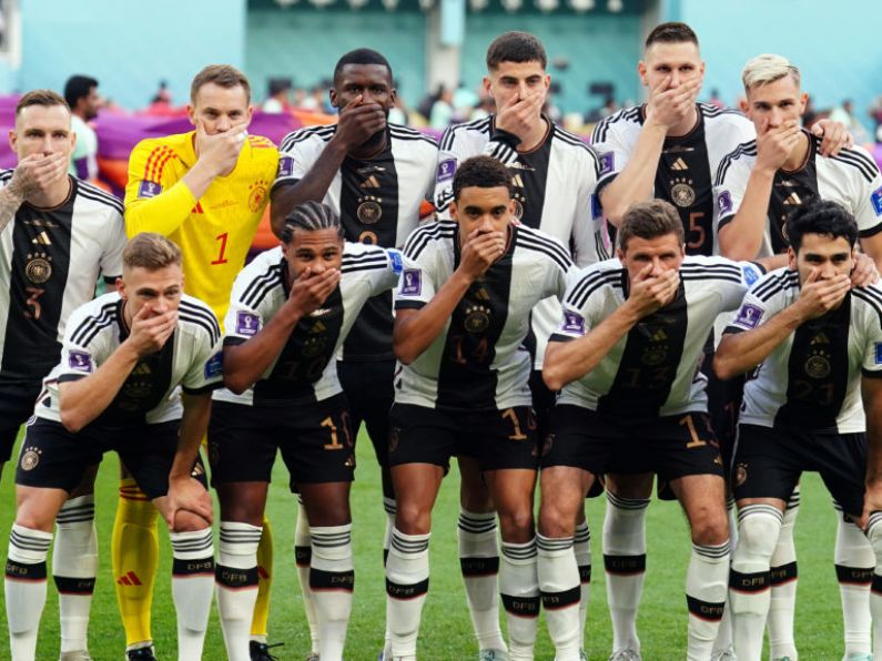 German players cover mouths for team photo in protest over OneLove armband ban