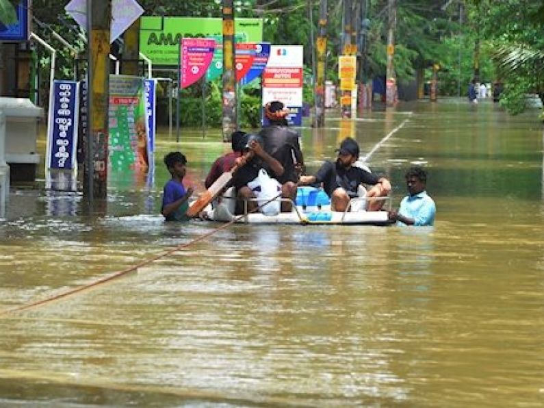 People plucked from rooftops as Indian floods kill more than 320 people