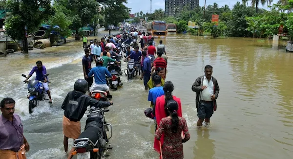 People plucked from rooftops as Indian floods kill more than 320 people