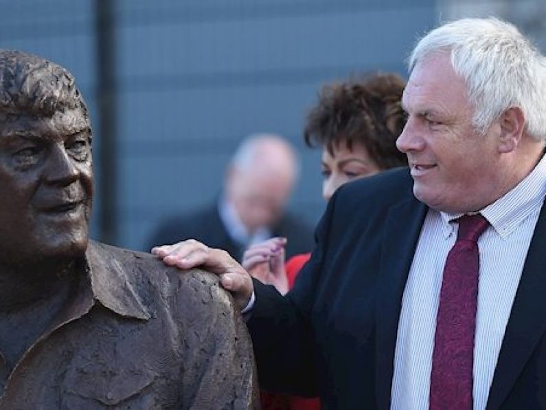 President pays tribute to Big Tom McBride's 'warmth and compassion' as he unveils country legend's statue