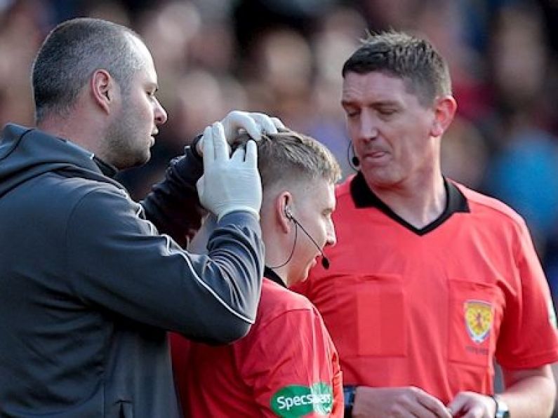 Police investigating as linesman bloodied by object thrown from Rangers fans' stand