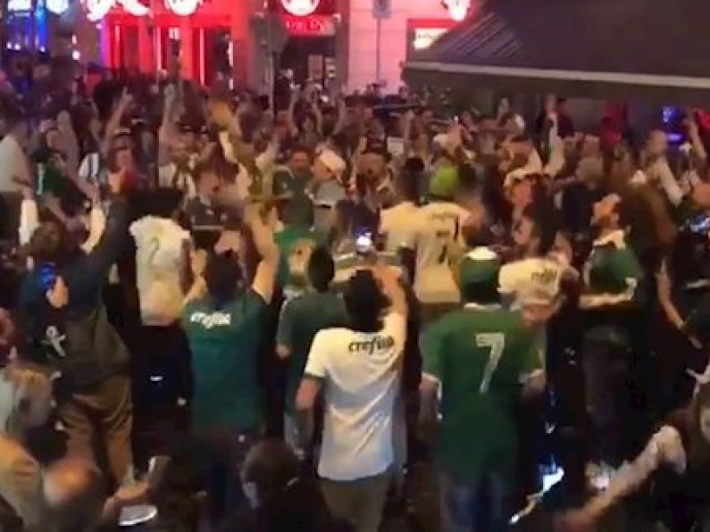 VIDEO: Brazilian soccer fans take over Temple Bar to celebrate home team's victory