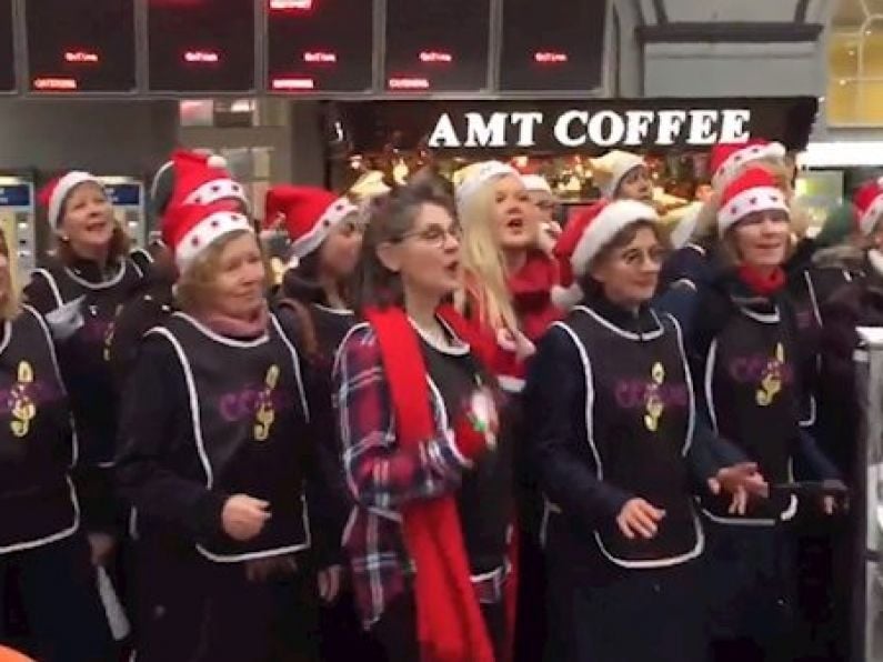 VIDEO: Choir helps commuters get into the festive spirit in aid of Focus Ireland