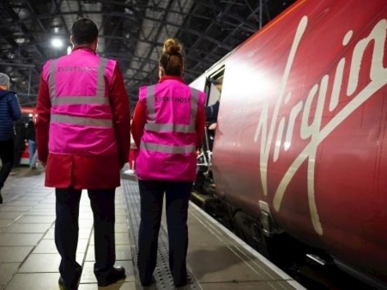 Rail staff with pink vests deployed to manage football fans in UK
