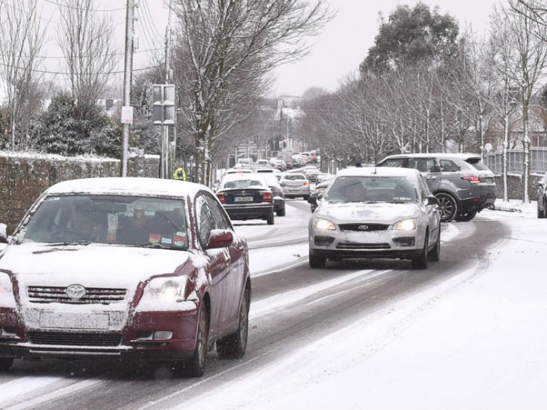 Drivers urged to take care amid snow and wind warnings