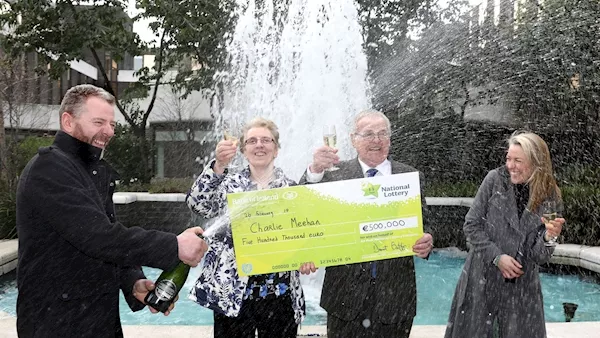 Retired farmer who survived cancer collects €500k EuroMillions cheque