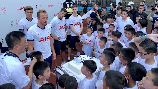 Spurs trio take on 100 local children in Shanghai heat