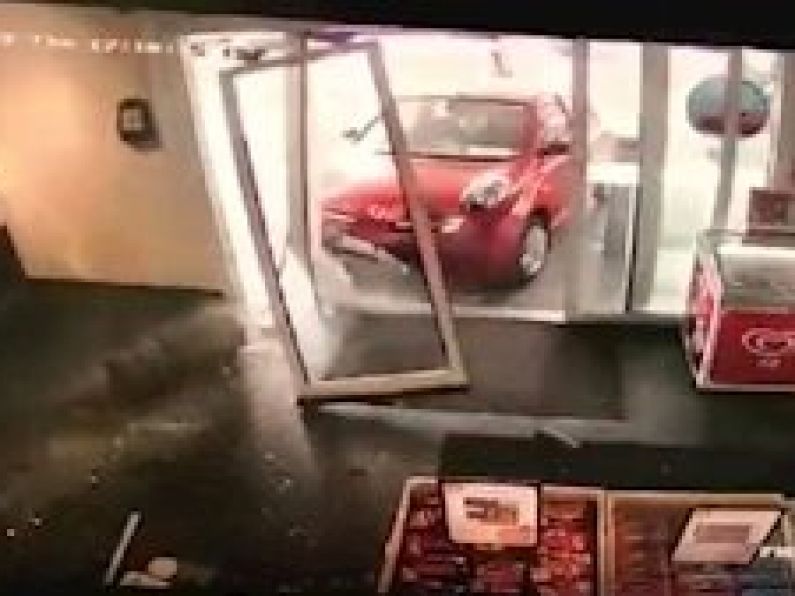 Watch: Lucky escape for shoppers after car crashes into filling station