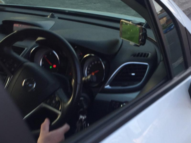 Driver faces €2,000 fine after been caught watching last night's Liverpool match while driving