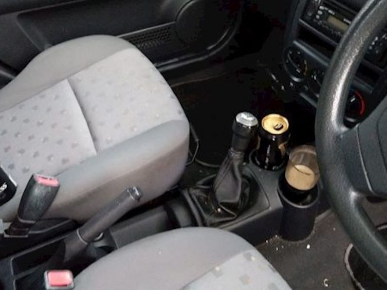 Police arrest man found with pint of Guinness in cup holder