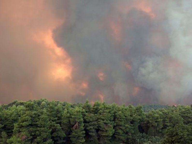 Athens blanketed in smoke as firefighters evacuate villages endangered by three wildfires