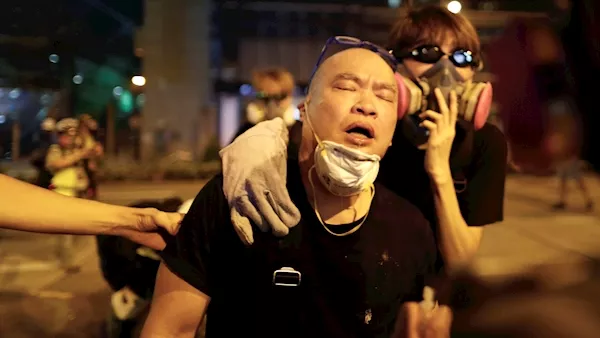Tear gas fired in new Hong Kong protest as police vow 'to bring all culprits to justice'