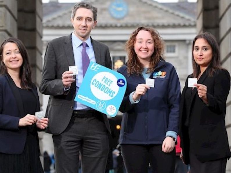 Minister launches service to make condoms freely available in colleges